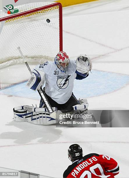 Jay Pandolfo of the New Jersey Devils scores a second period game tying goal against Karri Ramo of the Tampa Bay Lightning on April 3, 2009 at the...