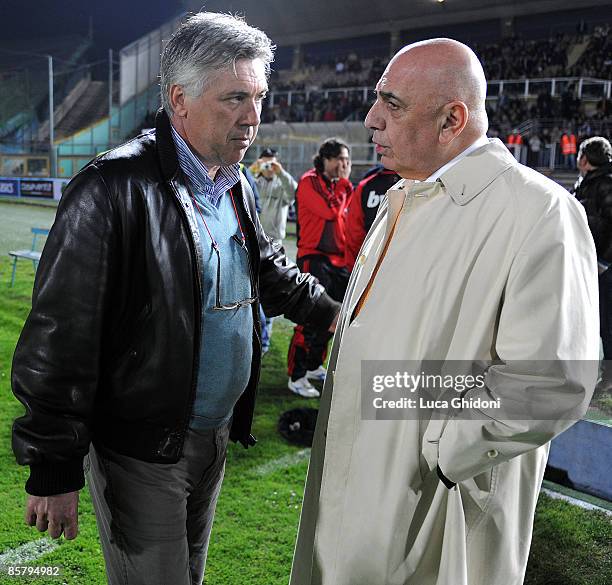 Carlo Ancelotti , trainer of AC Milan, and President Adriano Galliani attend the charity football match between Milan Glorie and Brescia Glorie at...