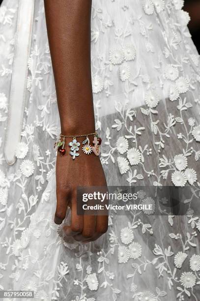 Model walks the runway during the Miu Miu Ready to Wear Spring/Summer 2018 fashion show as part of the Paris Fashion Week Womenswear Spring/Summer...