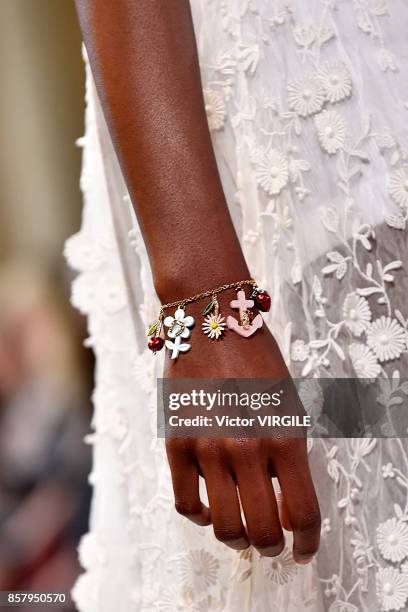 Model walks the runway during the Miu Miu Ready to Wear Spring/Summer 2018 fashion show as part of the Paris Fashion Week Womenswear Spring/Summer...