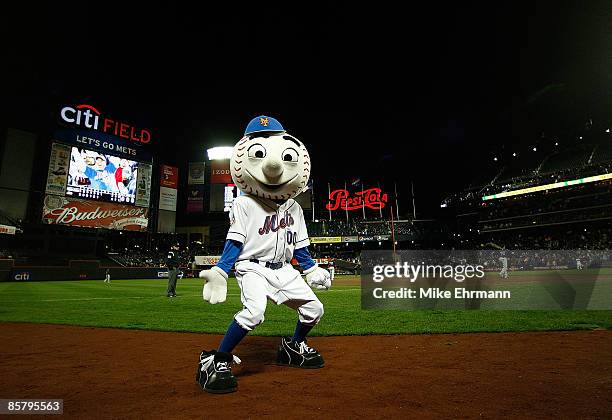 Mr Met gets the crowd going during an exhibition game between the New York Mets and the Boston Red Sox on April 3, 2009 at Citi Field in the Flushing...