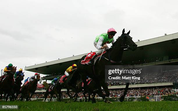 Brad Rawiller riding Phelan Ready wins Race 7 the AAMI Golden Slipper during the 2009 Golden Slipper Day meeting at Rosehill Gardens on April 4, 2009...