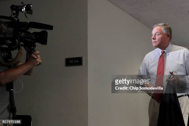 Senate Intelligence Committee Chairman Richard Burr leaves a closed-door hearing in the Hart Senate Office Building on Capitol Hill October 5, 2017...