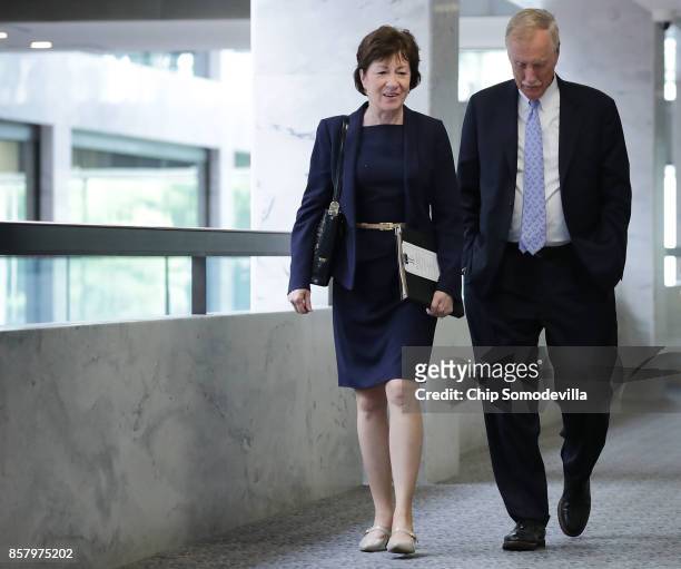 Senate Intelligence Committee members Sen. Susan Collins and Sen. Angus King arrive for a closed-door hearing in the Hart Senate Office Building on...