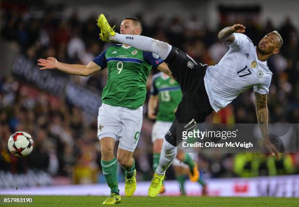 Belfast , United Kingdom - 5 October 2017; Conor Washington of Northern Ireland in action against Jérôme Boateng of Germany during the FIFA World Cup...