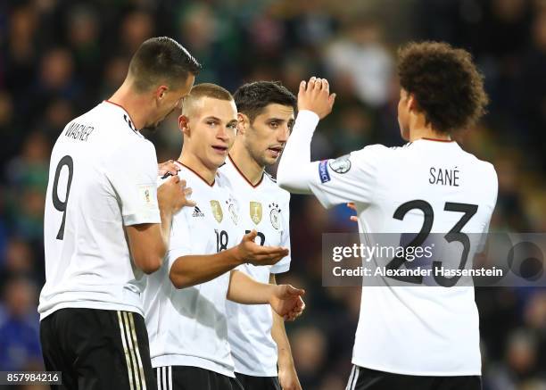 Joshua Kimmich of Germany celebrates scoring the third goal with Lars Stindl, Sandro Wagner and Leroy Sane during the FIFA 2018 World Cup Qualifier...