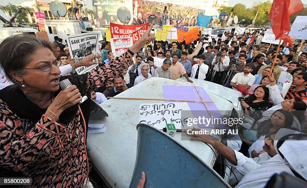 Pakistani human rights activist and lawyer Asma Jahangir addresses a protest rally in Lahore on April 4 against the public flogging of a veiled...