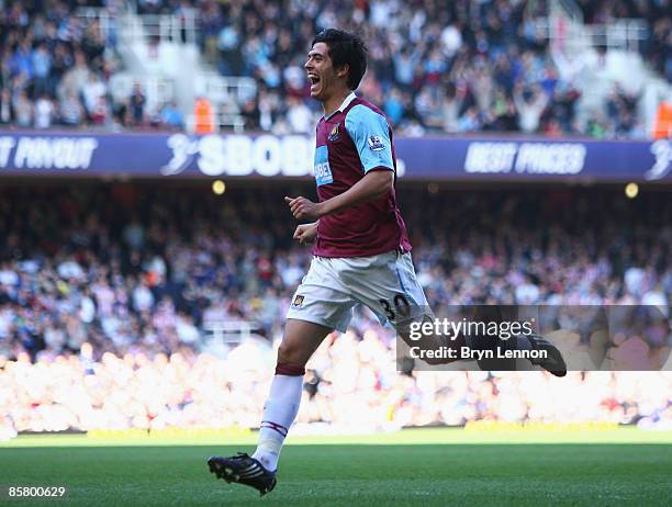 James Tomkins of West Ham United celebrates his goal during the Barclays Premier League match between West Ham United and Sunderland at Upton Park on...