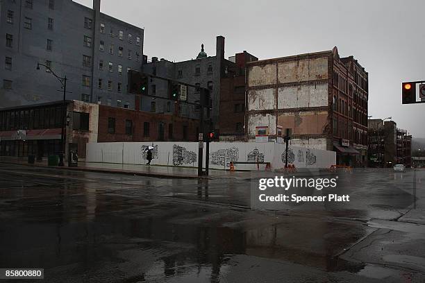 Dormant buildings are seen downtown April 4, 2009 in economically depressed Binghamton, New York. The gunman, who subsequently killed himself, has...