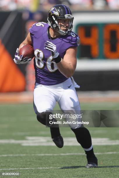 Nick Boyle of the Baltimore Ravens runs the football upfield during the game against the Cincinnati Bengals at Paul Brown Stadium on September 10,...