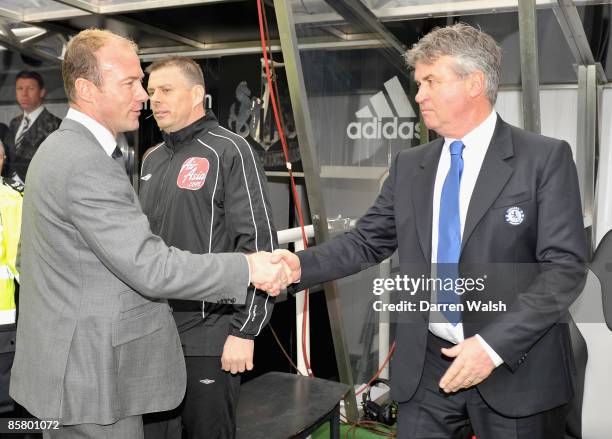 Chelsea Caretaker Manager Guus Hiddink shakes hands with Newcastle United Manager Alan Shearer prior to the Barclays Premier League match between...