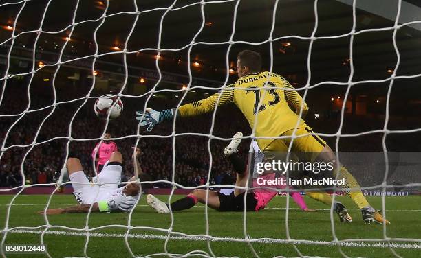 Martin Skrtel of Slovakia scores an own goal during the FIFA 2018 World Cup Qualifier between Scotland and Slovakia at Hampden Park on October 5,...