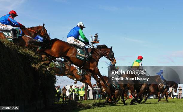 Comply Or Die ridden by Timmy Murphy clears Becher's Brook on their way to second place in the John Smith's Grand National Steeple Chase at Aintree...