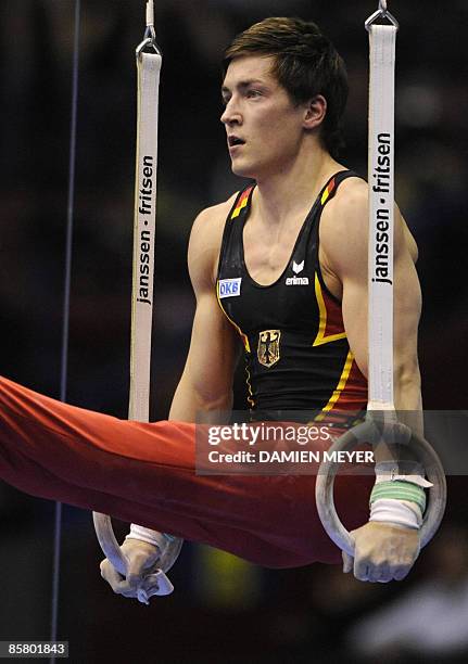 Germany's Philipp Boy performs on rings during the All-Around final of the Third European Men's Artistic Championships on April 4, 2009 in Assago,...