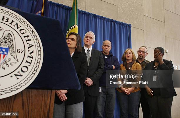 Public officals attend a news conference a day after a shooting where a gunman killed 13 people in an immigration community center April 4, 2009 in...