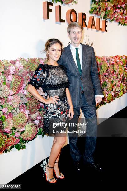 German presenter Nazan Eckes and Triumph owner Roman Braun attend the Florale By Triumph Dinner Hosted By Julianne Moore Dinner at Altes Stadthaus on...