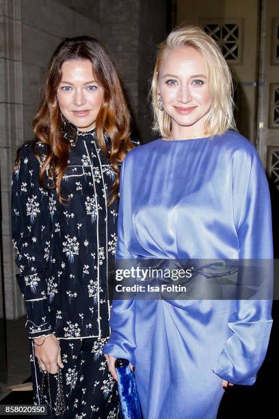 German actress Hannah Herzsprung and German actress Anna Maria Muehe attend the Florale By Triumph Dinner Hosted By Julianne Moore Dinner at Altes...