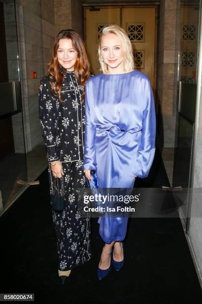 German actress Hannah Herzsprung and German actress Anna Maria Muehe attend the Florale By Triumph Dinner Hosted By Julianne Moore Dinner at Altes...