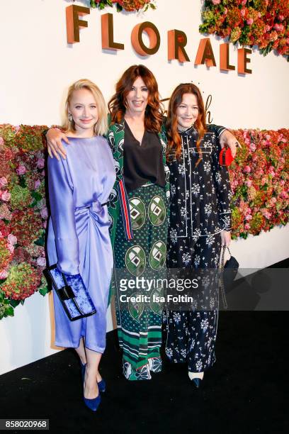 German actress Anna Maria Muehe, German actress Iris Berben and German actress Hannah Herzsprung attend the Florale By Triumph Dinner Hosted By...