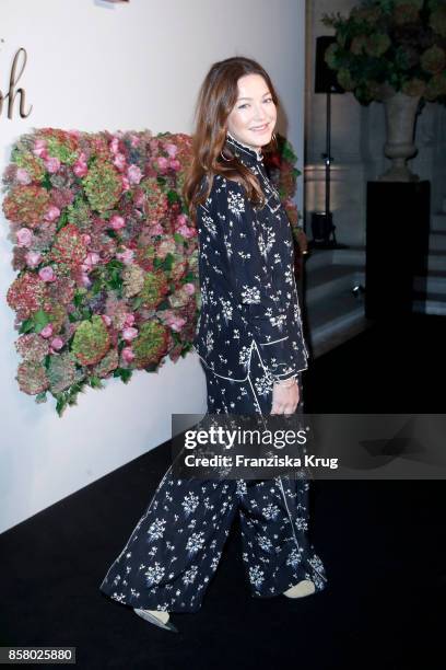 German actress Hannah Herzsprung in Erdem x H&M attends the Florale By Triumph Dinner Hosted By Julianne Moore at Altes Stadthaus on October 5, 2017...