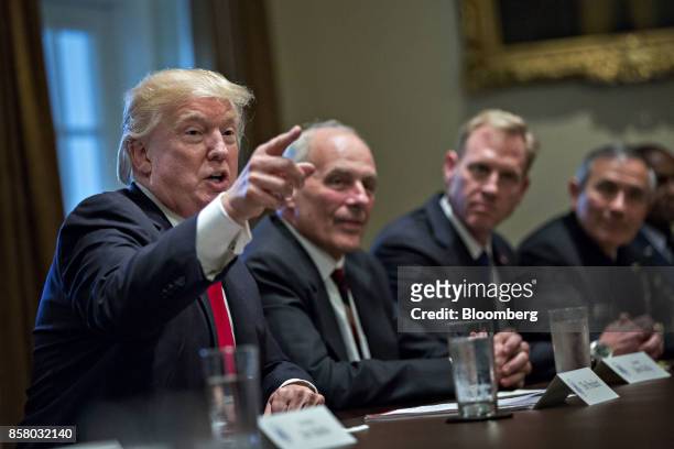 President Donald Trump, left, speaks during a briefing with senior military leaders in the Cabinet Room of the White House in Washington, D.C., U.S.,...