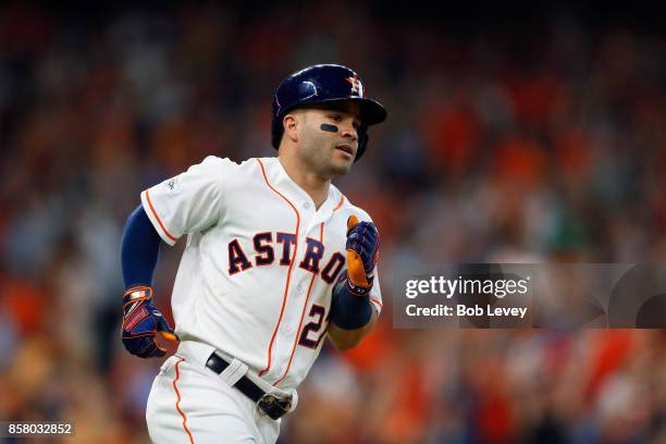 Jose Altuve of the Houston Astros runs the bases after hitting a home run in the seventh inning against the Boston Red Sox during game one of the...