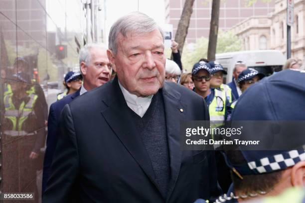 Cardinal George Pell leaves the Melbourne Magistrates' Court with a heavy Police escort on October 6, 2017 in Melbourne, Australia. Cardinal Pell was...