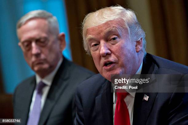 President Donald Trump speaks at a briefing with senior military leaders including Defense Secretary Jim Mattis in the Cabinet Room of the White...