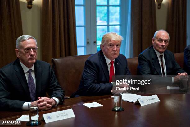 President Donald Trump , White House chief of staff John Kelly and Defense Secretary Jim Mattis attend a briefing with senior military leaders in the...