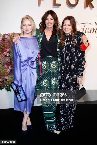 German actresses Anna Maria Muehe, Iris Berben and Hannah Herzsprung in in Erdem x H&M attend the Florale By Triumph Dinner Hosted By Julianne Moore...