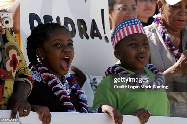 Family and friends cheer to welcome home members of XVIII Airborne Corps as seen at Pope Air Force Base April 4, 2009 in Fort Bragg, North Carolina....