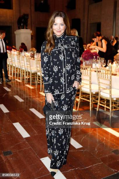 German actress Hannah Herzsprung in Erdem x H&M attends the Florale By Triumph Dinner Hosted By Julianne Moore at Altes Stadthaus on October 5, 2017...