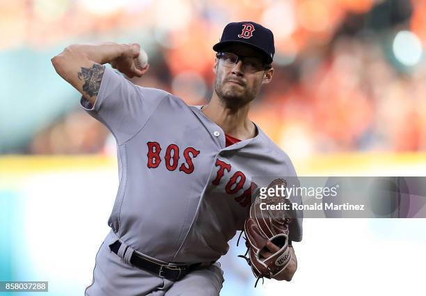 Joe Kelly of the Boston Red Sox throws against the Houston Astros in the sixth inning during game one of the American League Division Series at...