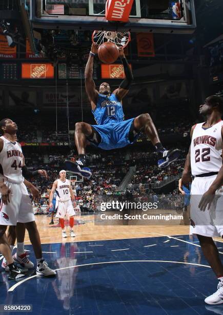 Dwight Howard of the Orlando Magic dunks against the Atlanta Hawks at Philips Arena on April 4, 2009 in Atlanta, Georgia. NOTE TO USER: User...