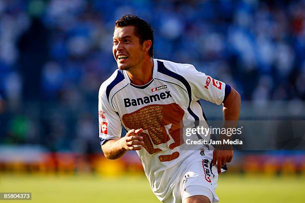 Dante Lopez of Pumas celebrates a goal during the Closing 2009 Tournament match of the Mexican Football League at the Azul Stadium on April 04, 2009...