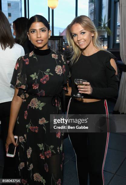 Arshai Moorjani and Iga Obrycka attend the launch of ghd hair North America Nocturne Holiday Campaign with Olivia Culpo & Justine Marjan on October...
