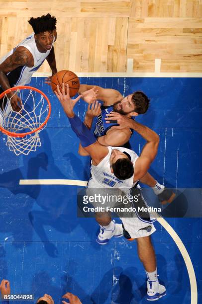 Jeff Withey of the Dallas Mavericks goes to the basket against the Orlando Magic during a preseason game on October 5, 2017 at Amway Center in...