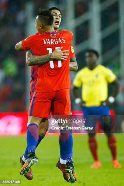 Eduardo Vargas of Chile celebrates with teammates after scoring the first goal of his team during a match between Chile and Ecuador as a part of FIFA...