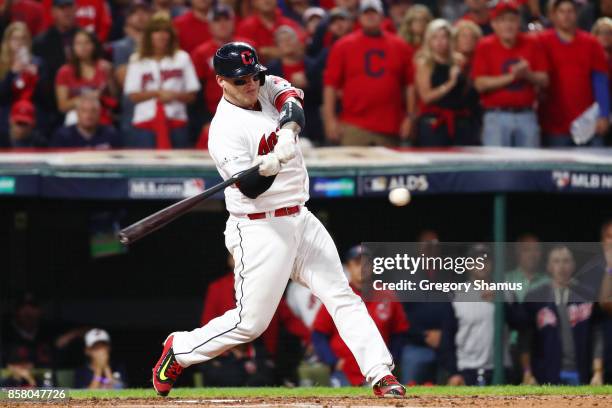 Roberto Perez of the Cleveland Indians grounds into an RBI double play during the second inning against the New York Yankees during game one of the...