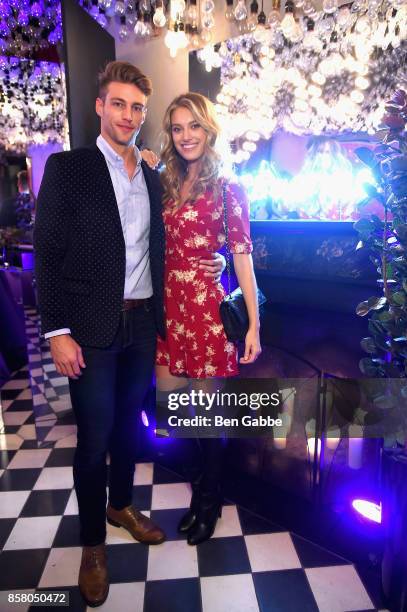 Heath Hutchins and Caroline Lowe attend the launch of ghd hair North America Nocturne Holiday Campaign with Olivia Culpo & Justine Marjan on October...