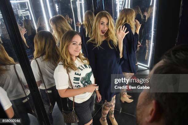 Guests attend the launch of ghd hair North America Nocturne Holiday Campaign with Olivia Culpo & Justine Marjan on October 5, 2017 in New York City.