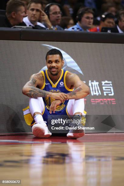 Michael Gbinije of the Golden State Warriors waits to get in the game against the Minnesota Timberwolves as part of 2017 NBA Global Games China on...
