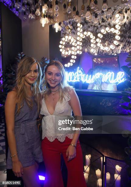 Guests attend the launch of ghd hair North America Nocturne Holiday Campaign with Olivia Culpo & Justine Marjan on October 5, 2017 in New York City.