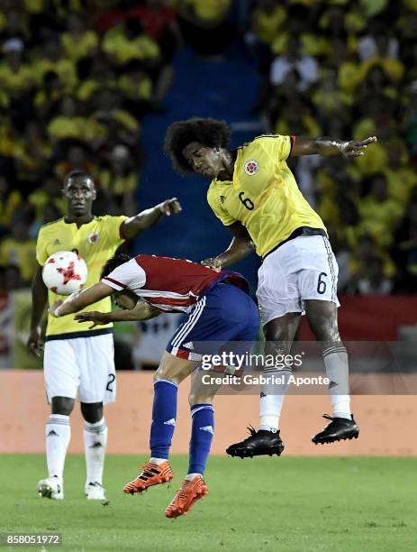 Carlos Sanchez of Colombia struggles for the ball with Angel Romero of Paraguay during a match between Colombia and Paraguay as part of FIFA 2018...