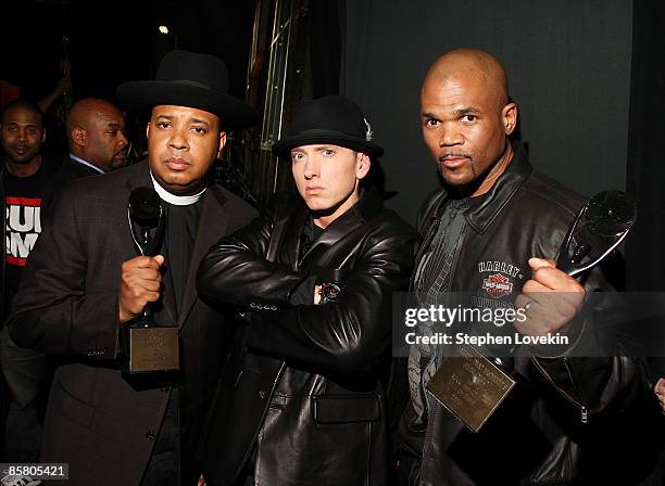 Rappers Joseph "Rev. Run" Simmons, Eminem and Darryl "D.M.C." McDaniels attend the 24th Annual Rock and Roll Hall of Fame Induction Ceremony at...