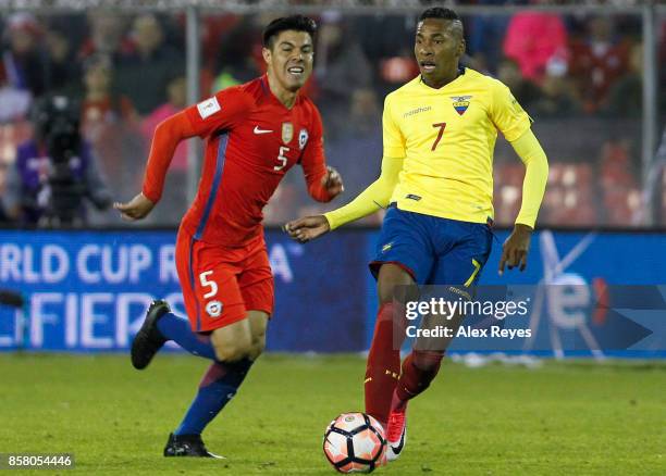 Ayrton Preciado of Ecuador fights for the ball with Francisco Silva of Chile during a match between Chile and Ecuador as part of FIFA 2018 World Cup...