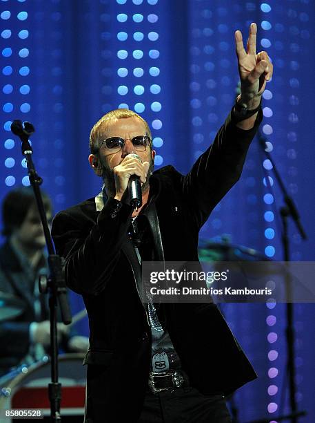 Musician Ringo Starr performs onstage at the David Lynch Foundation "Change Begins Within" show at Radio City Music Hall on April 4, 2009 in New York...