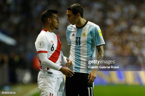 Angel Di Maria of Argentina and Miguel Trauco of Peru argue during a match between Argentina and Peru as part of FIFA 2018 World Cup Qualifiers at...