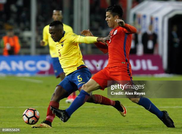 Renato Ibarra of Ecuador fights for the ball with Francisco Silva of Chile during a match between Chile and Ecuador as part of FIFA 2018 World Cup...
