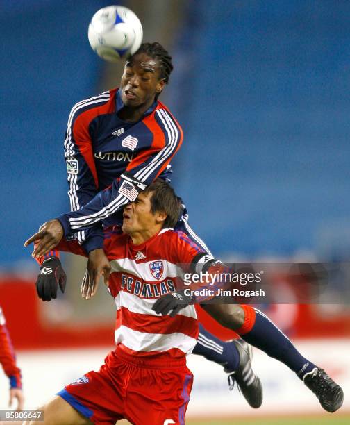 Shalrie Joseph of the New England Revolution beats Pable Ricchetti of the FC Dallas during an MLS match at Gillette Stadium on April 4, 2009 in...